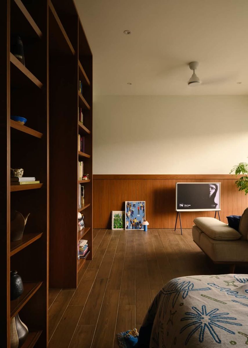 A timber-lined living room in a condo